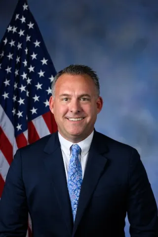 Official portrait of Rep. Adam Gray